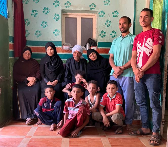The Gourouzian family, who lost a 20-year-old son, at their home in Nazlat al-Sharif, Egypt, in September 2023.