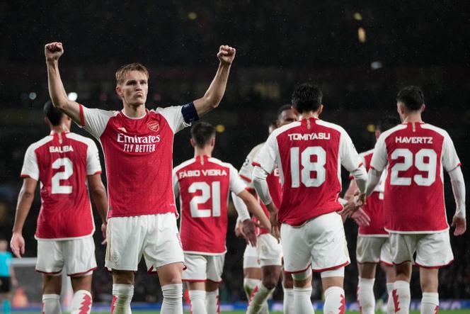 Arsenal's Martin Odegaard celebrates after scoring during the Group B Champion League soccer match, between Arsenal and PSV Eindhoven at the Emirates Stadium in London, Wednesday, September 20, 2023.