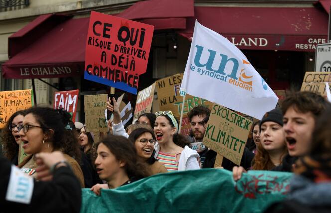 Students during a youth climate march in Paris, March 8, 2019.
