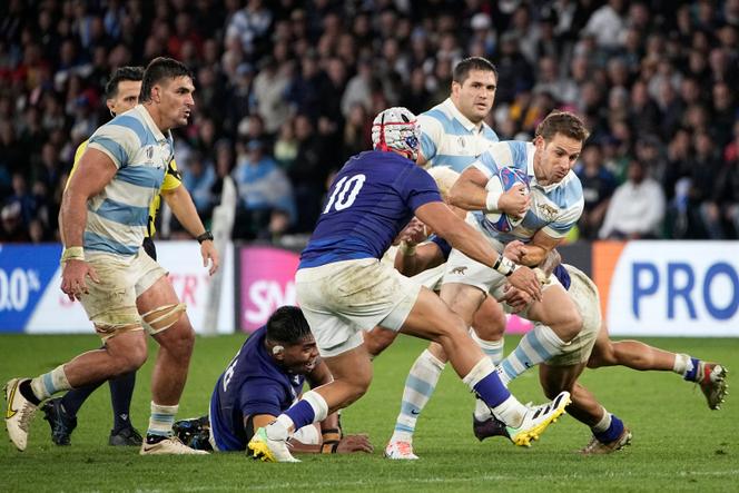 Argentina's Nicolas Sanchez, right, is challenged by Samoa's Christian Leali'ifano during the Rugby World Cup Pool D match between Argentina and Samoa at the Stade Geoffroy Guichard in Saint-Etienne, France, on September 22, 2023.