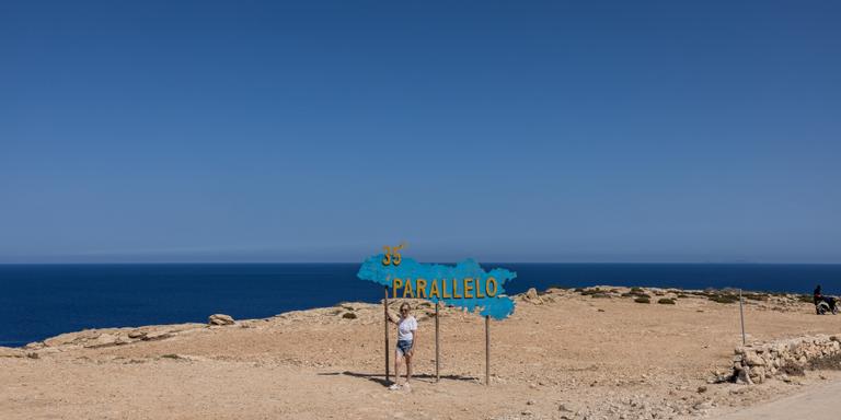 GIUSEPPE CAROTENUTO FOR LE MONDE A tourist on the island of Lampedusa on September 17, 2023.