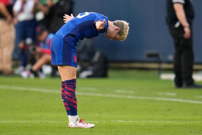 United States forward Megan Rapinoe takes a bow as she leaves the field during the second half of a soccer game against South Africa, Sunday, Sept. 24, 2023, in Chicago. (AP Photo/Erin Hooley)