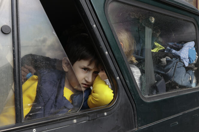 An Armenian boy from Nagorno-Karabakh upon his arrival in Goris, Sionik region, Armenia, on September 25, 2023. 