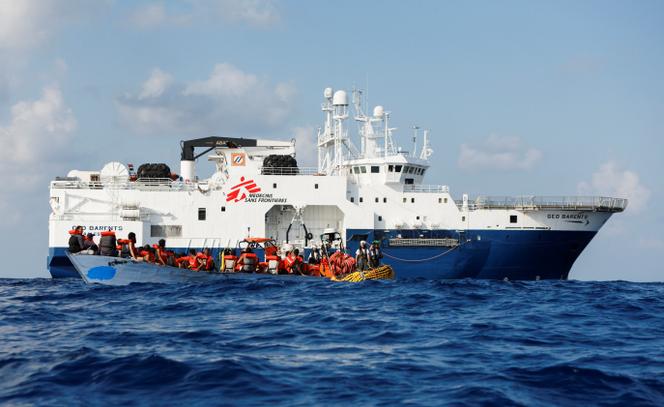 A group of 61 migrants on a wooden boat are rescued by the Geo Barents migrant rescue ship, operated by Doctors Without Borders, off the coast of Libya in the central Mediterranean Sea on September 28, 2023. 