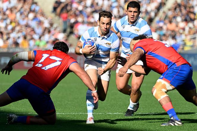 Argentina's fly-half Nicolas Sanchez runs with the ball during the Rugby World Cup match between Argentina and Chile at the Beaujoire Stadium in Nantes, west France, on September 30, 2023.