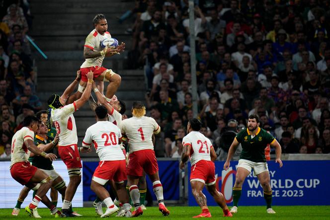 Tonga's captain Halaleva Fifita, top, wins a line out during the Rugby World Cup Pool B match between South Africa and Tonga at Marseille's Stade Velodrome, in Marseille, France Sunday, October 1, 2023.