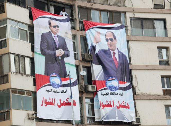 Posters of Egyptian President Abdel Fattah el-Sisi at a rally in support of his candidacy in the December 10-12 presidential election in Al-Galaa Square, Giza, on October 2, 2023.