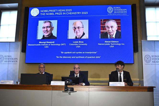Hans Ellegren (center), Permanent Secretary of the Royal Academy of Sciences, announces the 2023 Nobel Prize in Chemistry, at the Royal Academy of Sciences, Stockholm, October 4, 2023.