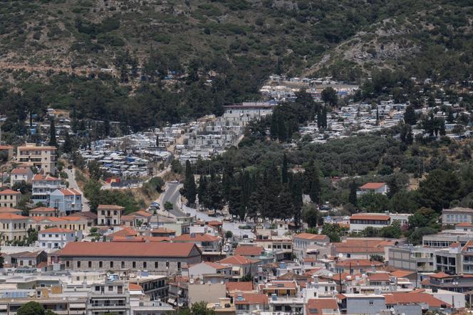 The port city of Vathy and the refugee and migrant camp, above, on the island of Samos in the eastern Aegean Sea, Greece, on June 11, 2021.