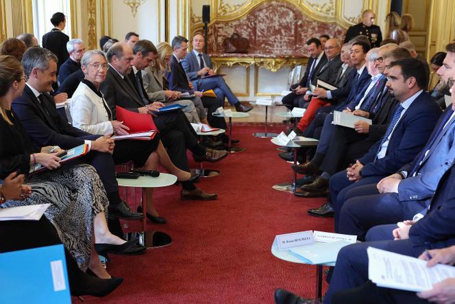 Prime Minister Elisabeth Borne accompanied by government spokesman Olivier Veran, Minister for Solidarity and Families Aurore Berge, Justice Minister Eric Dupond-Moretti and Interior Minister Gerald Darmanin at the post-riots National Council for Refoundation (CNR) at Hôtel Matignon in Paris on October 5, 2023.