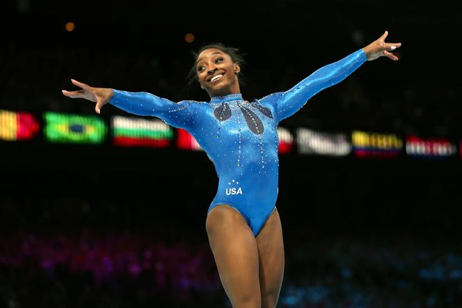 United States' Simone Biles celebrates winning the gold medal during the women's all-around final at the Artistic Gymnastics World Championships in Antwerp, Belgium, Friday, October 6, 2023.