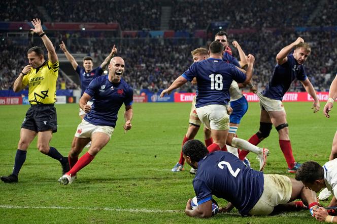 France's players celebrate after their teammate Peato Mauvaka scored a try during the Rugby World Cup Pool A match between France and Italy at the OL Stadium, in Lyon, France Friday, October 6, 2023.