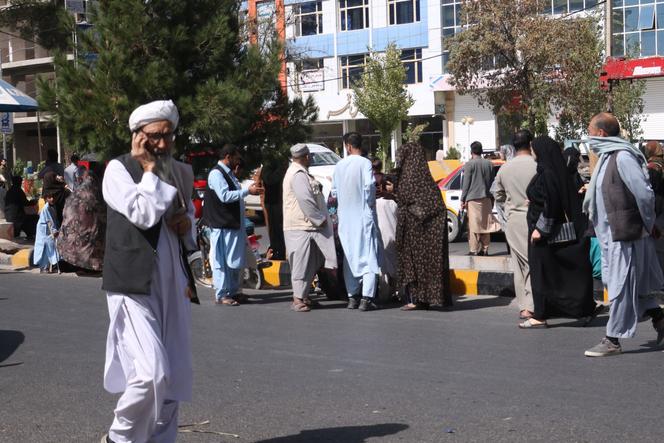 Residents come outside to a street after an earthquake rocked the city of Herat, Afghanistan, on October 7, 2023. 