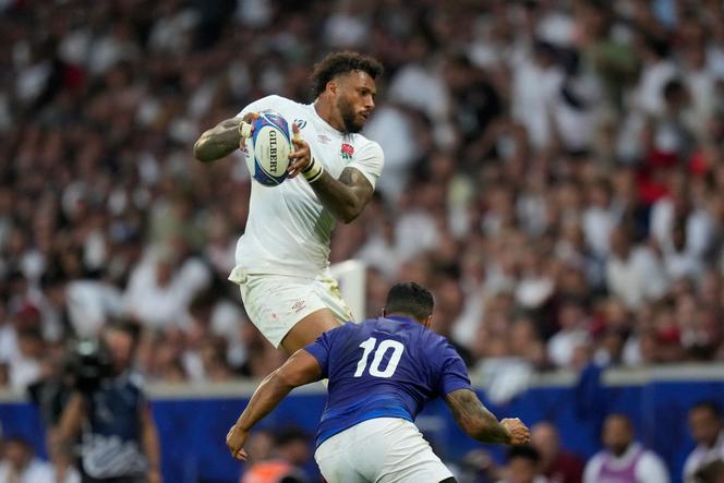 England's Courtney Lawes jumps during the Rugby World Cup Pool D match between England and Samoa at the Stade Pierre Mauroy in Villeneuve-d'Ascq, outside Lille, Saturday, Oct. 7, 2023. 