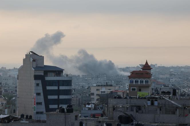 Smoke billows from Rafah during Israeli airstrikes targeting the southern Gaza Strip, early on October 8, 2023.