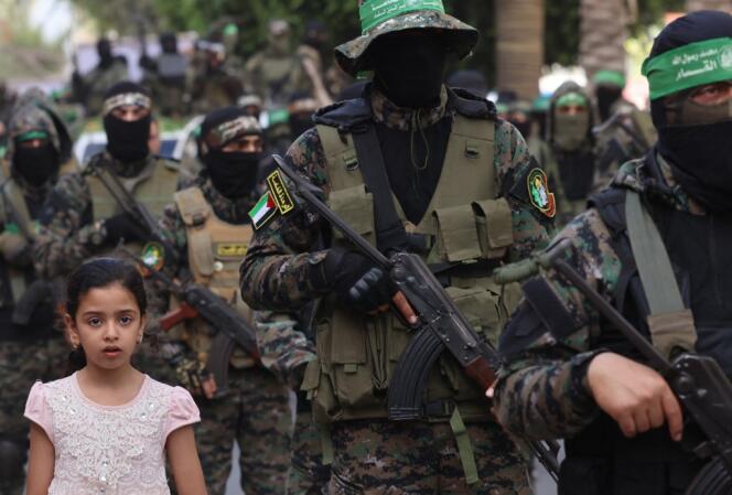 Members of the Ezzedine Al-Qassam Brigades, the armed wing of Hamas, march in Gaza City, May 22, 2021.