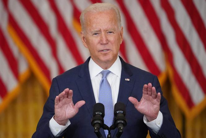 US President Joe Biden speaks in the East Room of the White House in Washington, DC, on August 12, 2021.