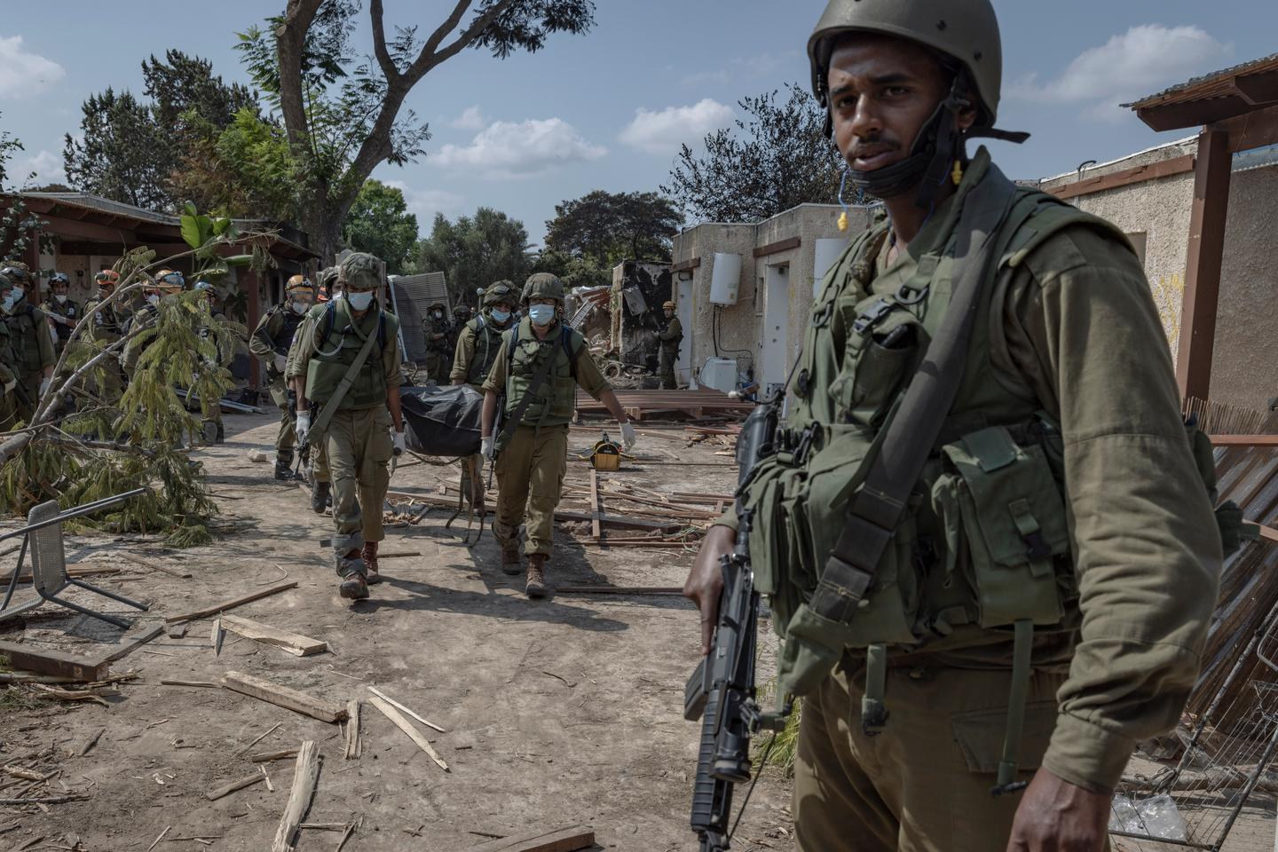 Hamas's massacre in Kfar Aza 'We collect the bodies and put them in