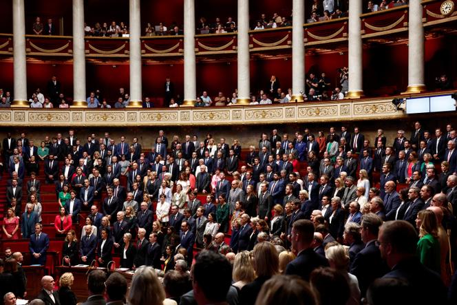 Members of the government and MPs hold a minute's silence in tribute to the victims of the conflict between Israel and the Palestinian Islamist group Hamas, before the government question session, at the Assemblée Nationale, in Paris, on October 10, 2023.