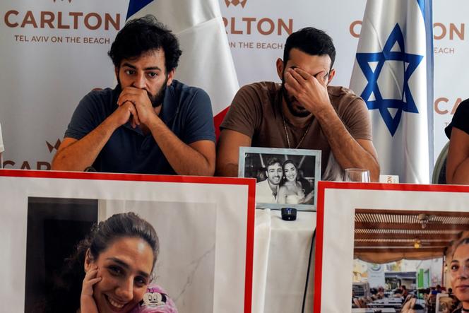 Family members emote as they speak at a press conference for relatives of missing French citizens, following an attack by Hamas gunmen from Gaza, at the Carlton Hotel in Tel Aviv, Israel October 12, 2023. 