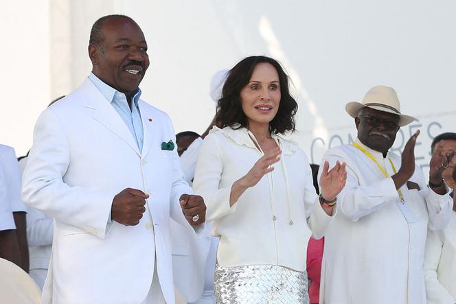 Gabon President Ali Bongo Ondimba (L) and Gabon First Lady Sylvia Bongo Ondimba (2nd L) at the Nzang Ayong stadium in Libreville on July 10, 2023.