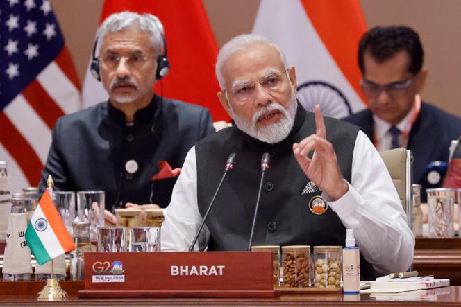 India's Prime Minister Narendra Modi speaks during the first session of the G20 Leaders' Summit at the Bharat Mandapam in New Delhi on September 9, 2023.