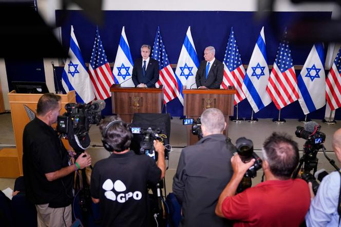 Israeli Prime Minister Benjamin Netanyahu (R) and US Secretary of State Antony Blinken make statements to the media, inside The Kirya, which houses the Israeli Ministry of Defense, after their meeting in Tel Aviv on October 12, 2023.