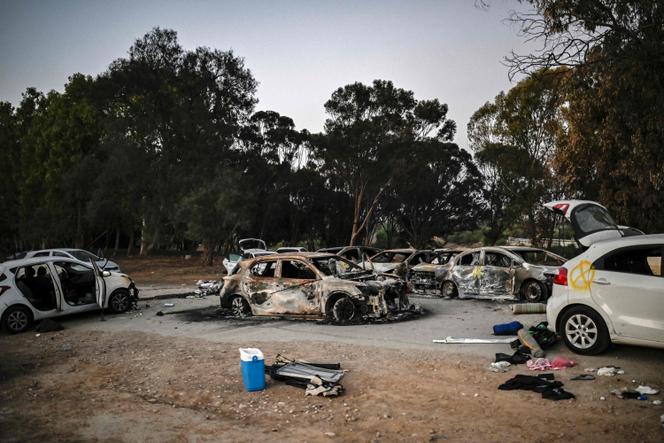 Charred vehicles on October 12, 2023, after the Hamas attack on a music festival near Be'eri kibbutz (Israel) five days earlier.
