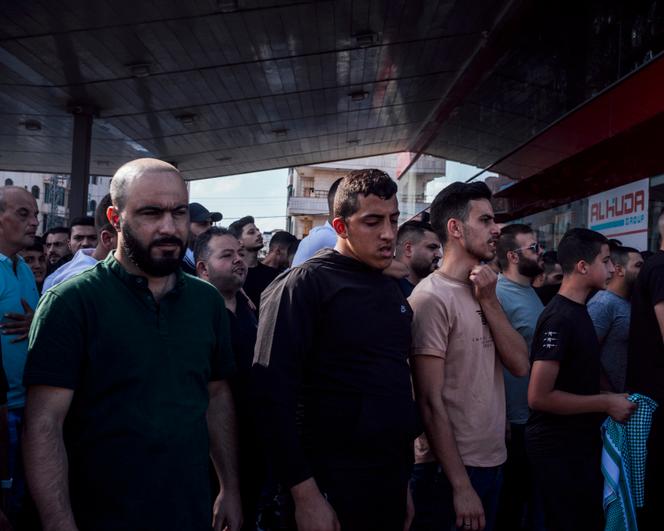 Palestinian demonstrators protest against the occupation and the Israeli military operation in Gaza, in Ramallah, October 13, 2023.