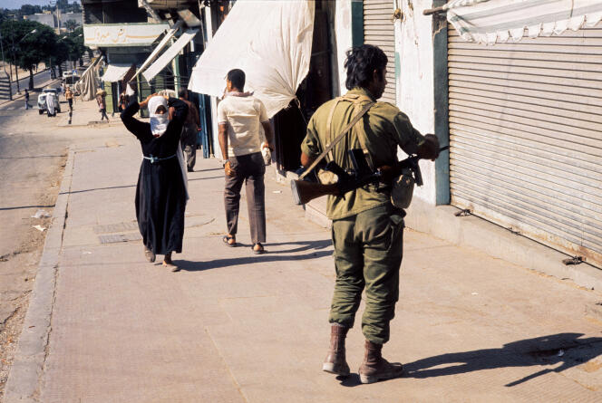 An Israeli soldier patrols a street in occupied Gaza during the Yom Kippur War on October 21, 1973. 