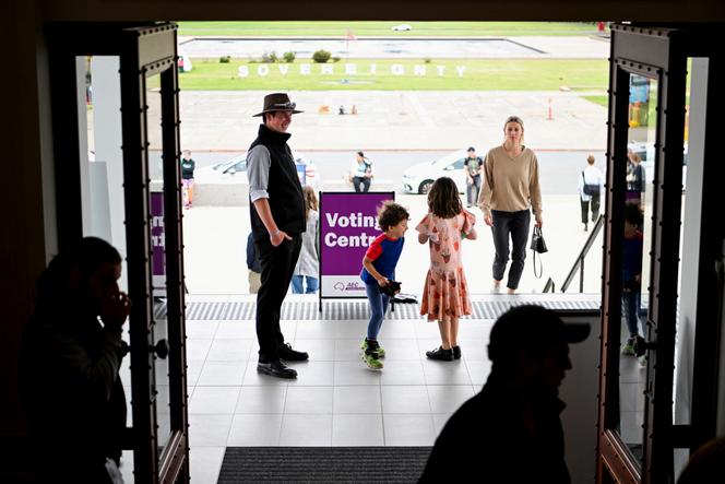 Voters arrive to cast their ballot at the Old Australian Parliament House, during The Voice referendum in Canberra, Australia, October 14, 2023.