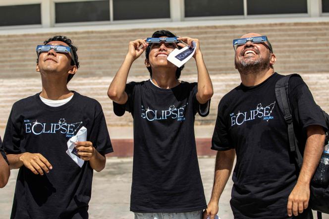 People watch the annular solar eclipse in Merida, State of Yucatan, Mexico, on October 14, 2023. 