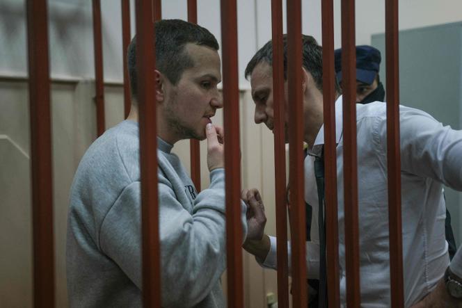 Alexei Navalny’s lawyer, Alexey Liptser (left), appears in court in Moscow on October 13, 2023. 