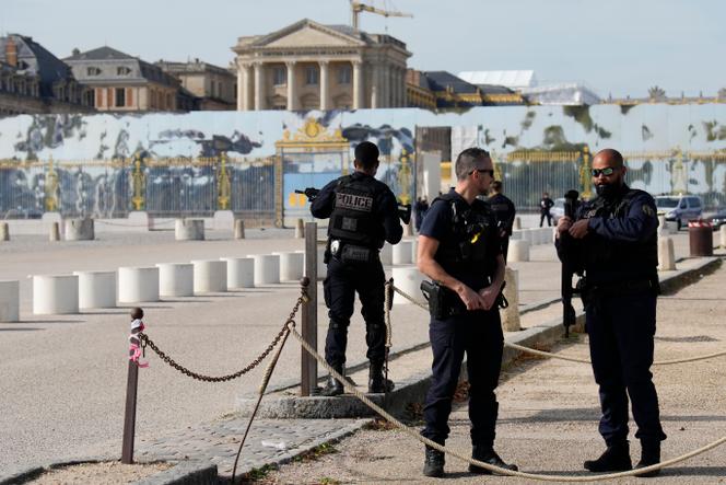 French police officers guard the entrance of the Chateau de Versailles after a security alert on Tuesday, October 17, 2023, in Versailles, west of Paris.