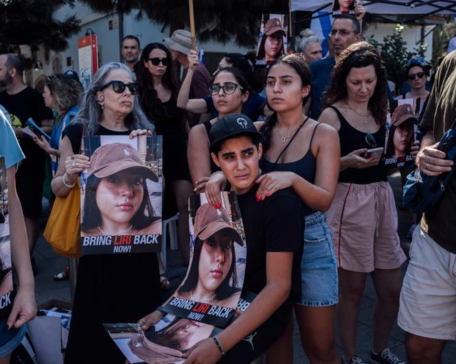 The family of 18-year-old Liri, taken hostage by Hamas, in front of the Israeli army headquarters in Tel Aviv on October 14, 2023.