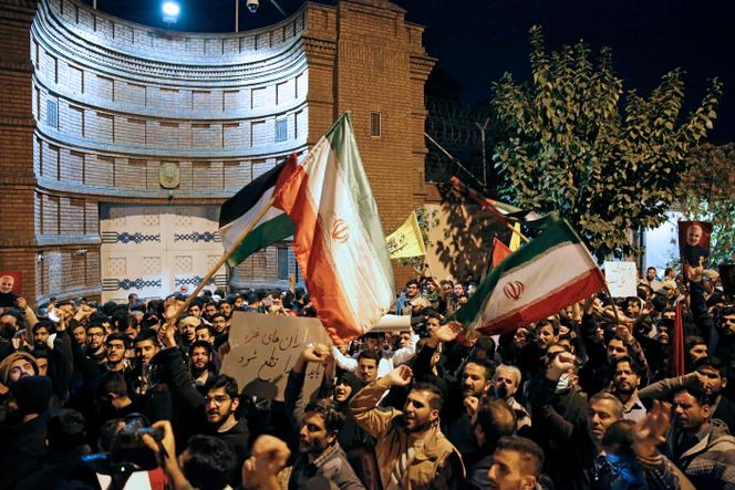 Iranian students and demonstrators protest in support of Palestinians in front of the French embassy in Tehran, early morning on October 18, 2023. 