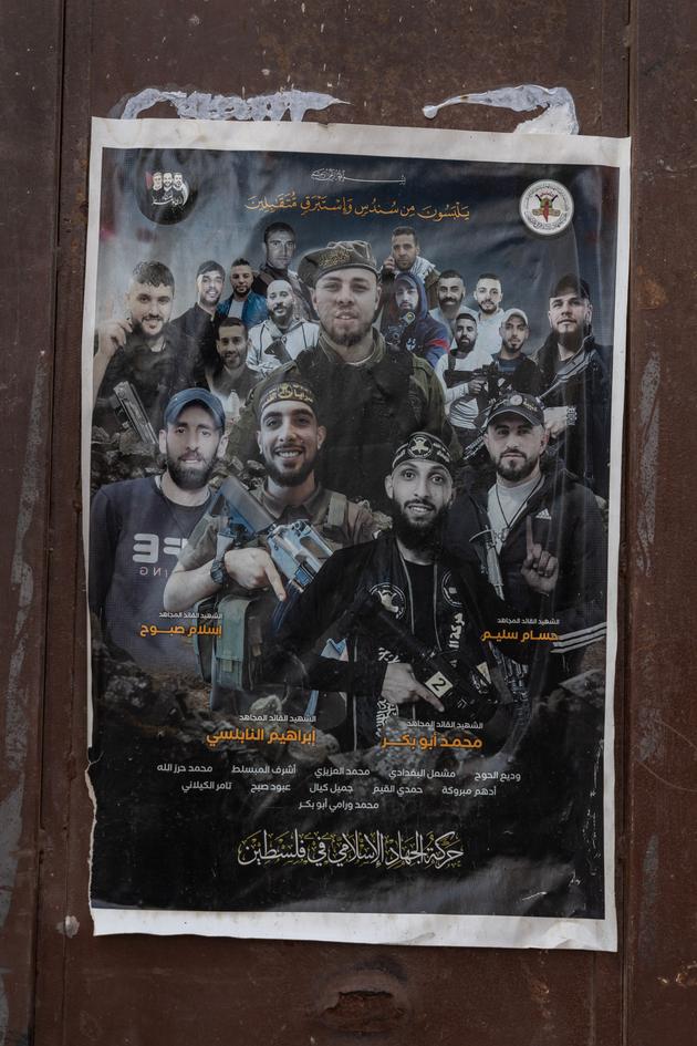 A poster commemorating the martyrs on a gate in the Balata refugee camp in Nablus (West Bank), on October 18, 2023.