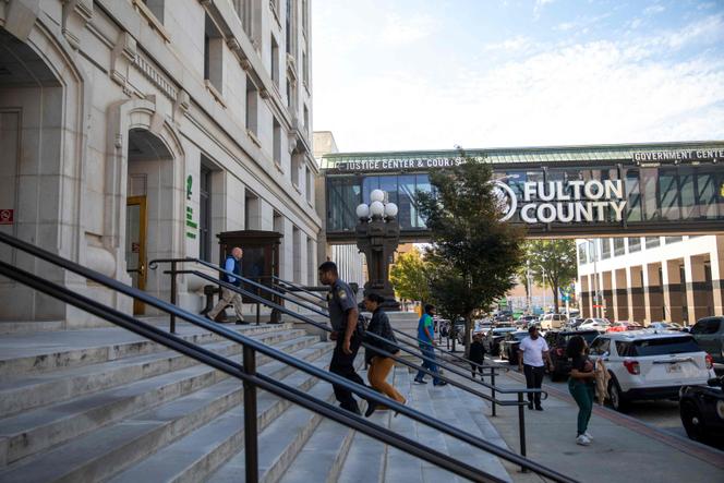 People enter the Fulton County Courthouse on October 19, 2023 in Atlanta, Georgia.