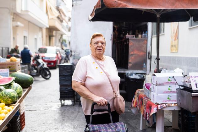 Sophia Soropidou, 77, at a fruit market in Athens, October 17, 2023.