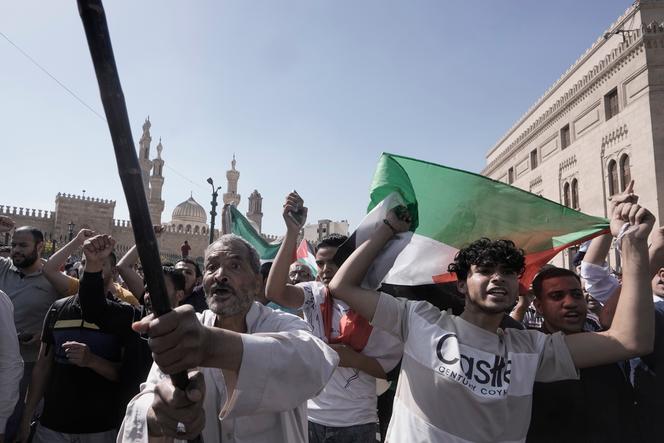 Protesters shout anti-Israel slogans during a rally to show solidarity with the people of Gaza after Friday prayers outside Azhar mosque, the Sunni Muslim world's premier Islamic institution, in Cairo, Egypt, Friday, Oct. 20, 2023.