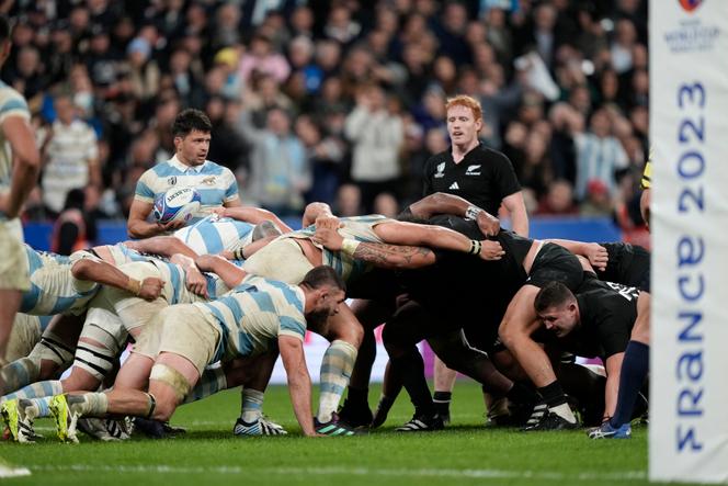 Players confront in a scrum during the Rugby World Cup semifinal match between Argentina and New Zealand at the Stade de France in Saint-Denis, outside Paris, Friday, October 20, 2023.