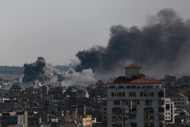 Smoke rises following Israeli airstrikes on Gaza City, Saturday, Oct. 21, 2023.