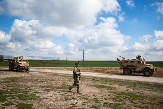 US soldiers patrol the town of al-Qahtaniyah, in Syria's al-Hasakeh province, on March 14, 2022.