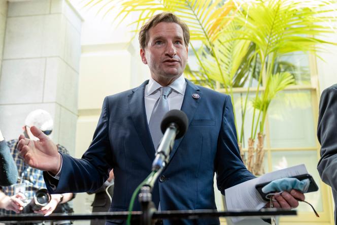 Rep. Dean Phillips, a Minnesota Democrat, speaks with reporters after a Democratic caucus meeting on Capitol Hill, Friday, Oct. 1, 2021, in Washington.