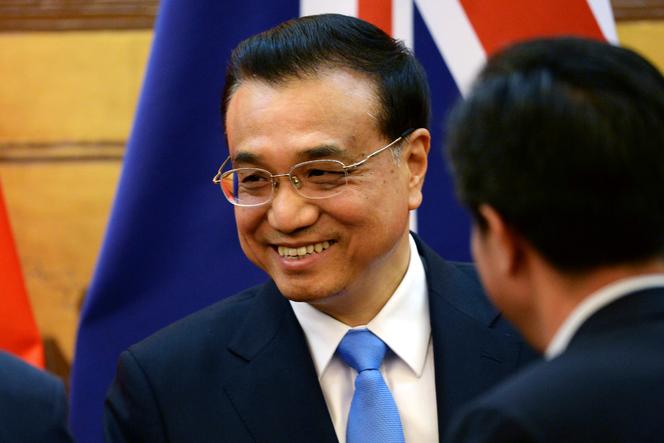 Then Chinese Premier Li Keqiang attends a signing ceremony with Australian Prime Minister Malcolm Turnbull at the Great Hall of the People in Beijing, China, on April 14, 2016.