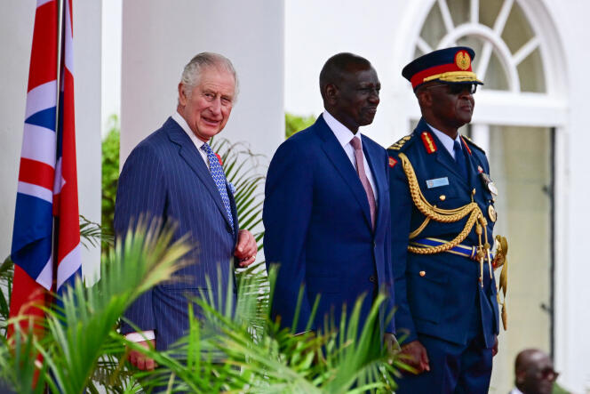 King Charles III (left) with Kenyan President William Ruto (center) during the welcoming ceremony at State House in Nairobi, October 31, 2023.