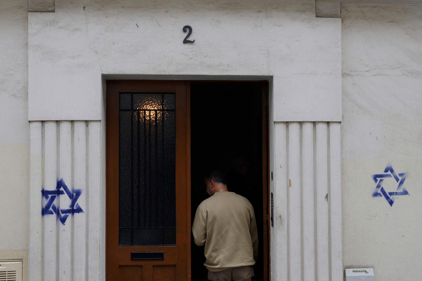 Paris prosecutor opens investigation after Stars of David found tagged on buildings