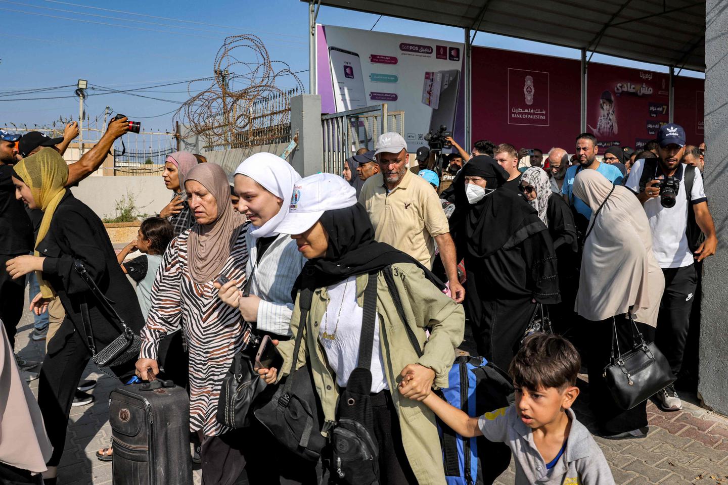 76 wounded Palestinians and 335 foreigners in first evacuations from Gaza, refugee camp struck again