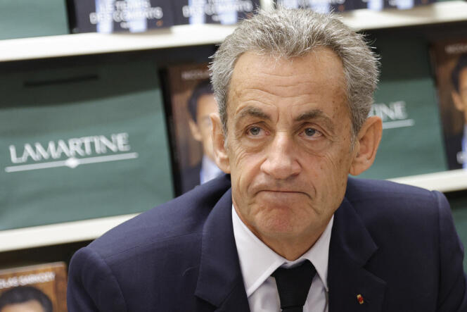 Former French president Nicolas Sarkozy at a book signing for his book 