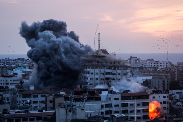 Gaza City during an Israeli air strike on October 7. On this day, medical sources in Gaza claim that at least 198 Palestinians were killed in Israeli air attacks.